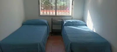 Cama o camas de una habitación en Villa Oasis