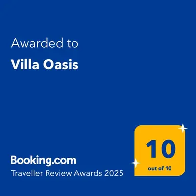 Certificado, premio, señal o documento que está expuesto en Villa Oasis