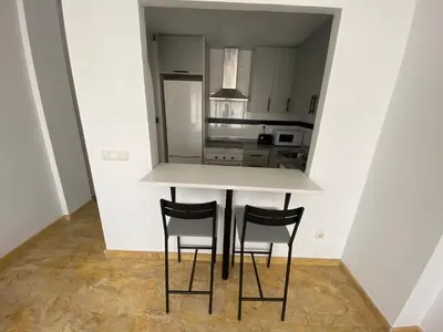 Una cocina o zona de cocina en APARTAMENTO ATICO Vera playa Puerto Rey