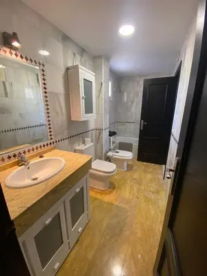 Un baño de APARTAMENTO ATICO Vera playa Puerto Rey
