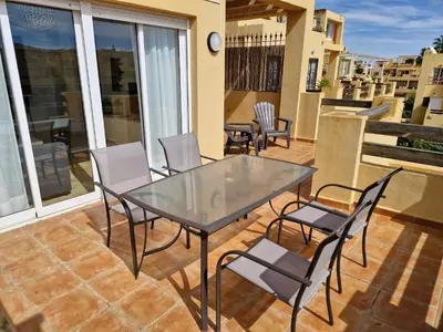 Un balcón o terraza de APARTAMENTO ATICO Vera playa Puerto Rey