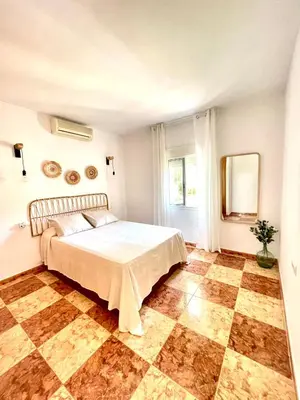 Cama o camas de una habitación en Villa Garriga