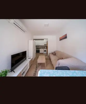 Una televisión o centro de entretenimiento en Playa Zapillo Costa