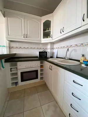 Una cocina o zona de cocina en Apartamento El Palmeral Aguadulce