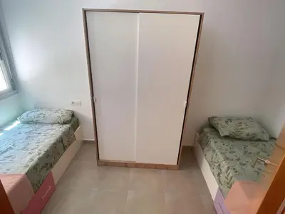 Cama o camas de una habitación en Capital Seaview