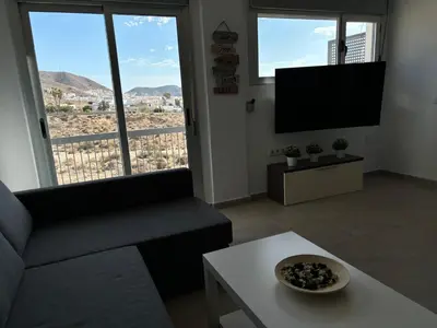 Una televisión o centro de entretenimiento en Capital Seaview