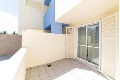 Un balcón o terraza de TrendyHomes Marina Golf