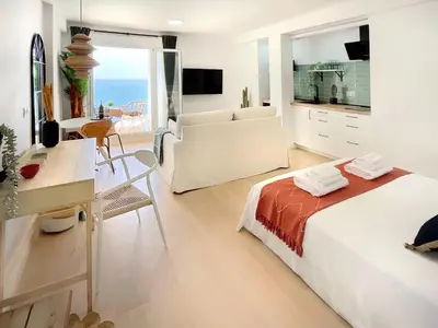 Una televisión o centro de entretenimiento en KS Costa Zapillo 7C1 - Kaleria Suites
