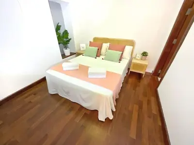 Cama o camas de una habitación en Casa de la lonja Fondón