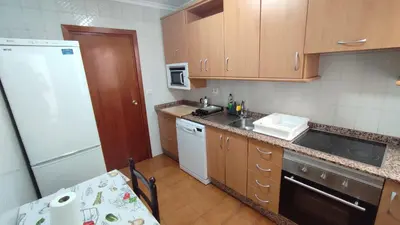 Una cocina o zona de cocina en Piso céntrico san juan de los terrenos