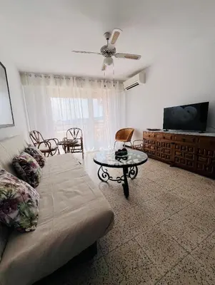 Una televisión o centro de entretenimiento en Apartamento Lebeche