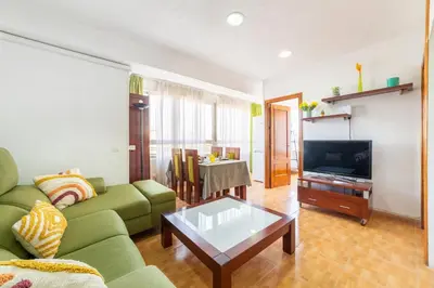 Una televisión o centro de entretenimiento en Apartamento El Cable