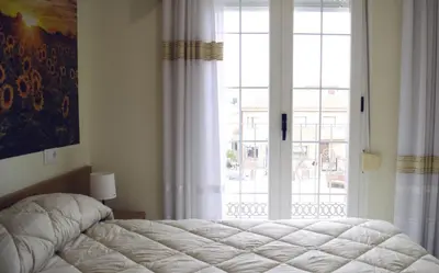 Cama o camas de una habitación en Casa del Sol y la Luna Apartamento Atardecer