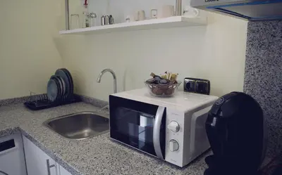 Una cocina o zona de cocina en Casa del Sol y la Luna Apartamento Atardecer
