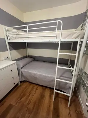 Cama o camas de una habitación en Apartamentos Fénix