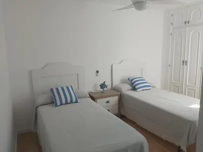 Cama o camas de una habitación en El espigón de Aguadulce