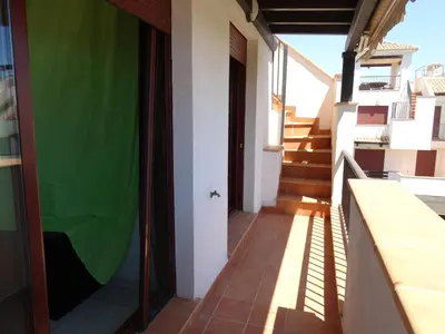 Un balcón o terraza de ÁTICO NUEVO VERA SOLARiUM URBANIZACION A PIE DE PLAYA