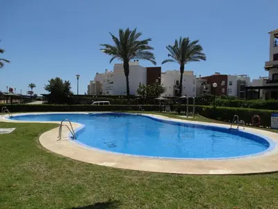 Piscina en o cerca de ÁTICO NUEVO VERA SOLARiUM URBANIZACION A PIE DE PLAYA
