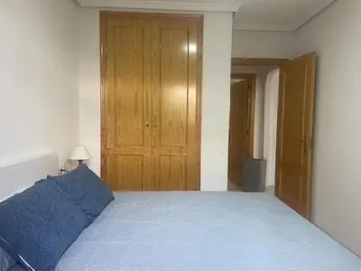 Cama o camas de una habitación en APARTAMENTO VERAMAR 6 WiFi-Smart- TV