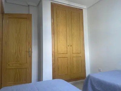 Cama o camas de una habitación en APARTAMENTO VERAMAR 6 WiFi-Smart- TV