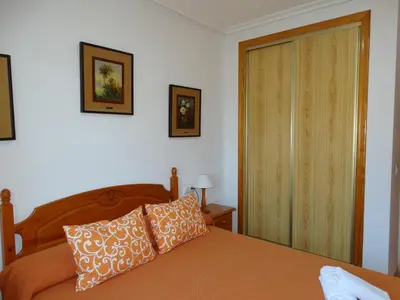 Cama o camas de una habitación en ATICO VERAMAR 5 JUNTO A LA PLAYA WiFi-SMART-TV
