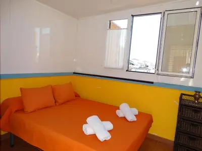 Cama o camas de una habitación en ATICO VERAMAR 5 JUNTO A LA PLAYA WiFi-SMART-TV