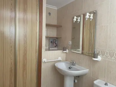 Un baño de ATICO VERAMAR 5 JUNTO A LA PLAYA WiFi-SMART-TV