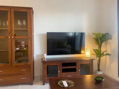 Una televisión o centro de entretenimiento en Precioso Apartamento en Vera Playa