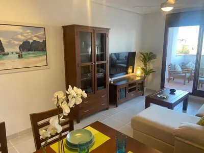 Una televisión o centro de entretenimiento en Precioso Apartamento en Vera Playa