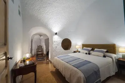 Cama o camas de una habitación en Cuevas de Kabila