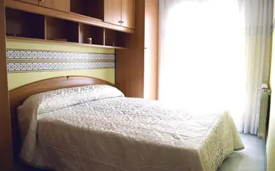 Cama o camas de una habitación en Casa Del Sol y la Luna Apartamento Medio Día