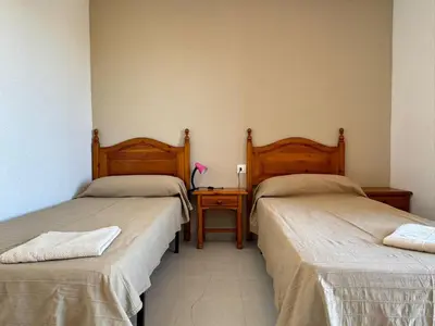 Cama o camas de una habitación en Dúplex playa Las Marinas - Vera Playa