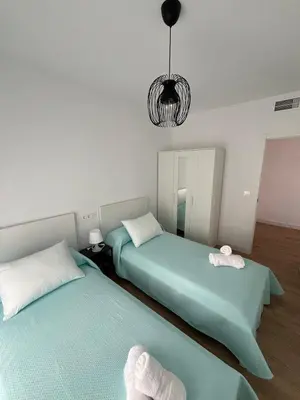 Cama o camas de una habitación en Apartamento San Antonio 1