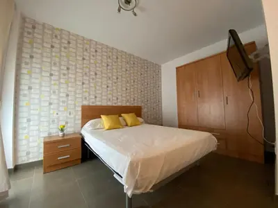 Cama o camas de una habitación en Candela 55 Dúplex con terraza y piscina