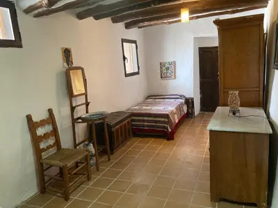 Cama o camas de una habitación en La Fuente del Paraiso