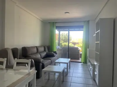 Zona de estar de APARTAMENTO BAJO TERRAZA URBANIZACION ACCESO DiRECTO PLAYA