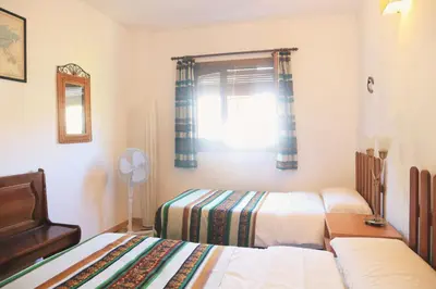 Cama o camas de una habitación en Apartamento en Bérchules