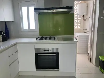 Una cocina o zona de cocina en El Jardín del Camaleón