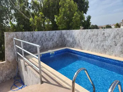Piscina en o cerca de Ático precioso muy luminoso con piscina privada!