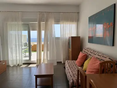 Zona de estar de Candela 53 Dúplex con terraza y piscina