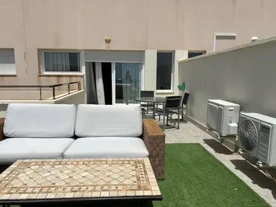 Zona de estar de Candela 53 Dúplex con terraza y piscina