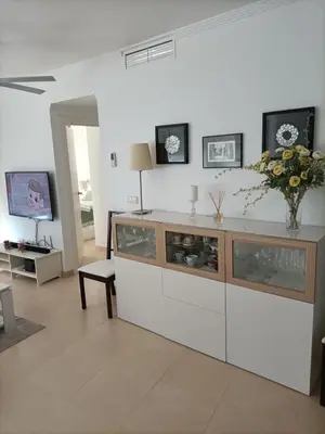 Una televisión o centro de entretenimiento en Apartamento Hornillo
