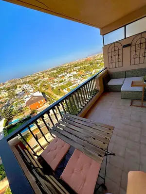 Un balcón o terraza de VIVE la PLAYA a 5 min con VISTAS-PISCINA-AIRE ACONDICIONADO-VENTILADORES DE TECHO-WIFI-Orientacion Sur