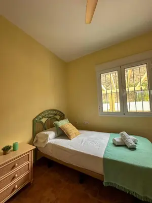 Cama o camas de una habitación en Casa Rural El Pomelo
