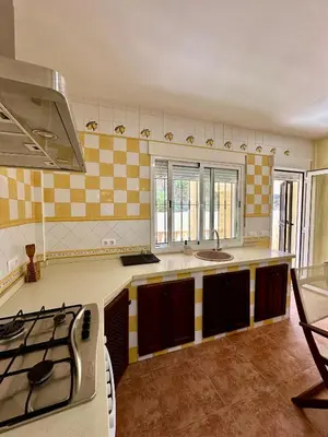 Una cocina o zona de cocina en Casa Rural El Pomelo