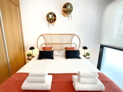 Cama o camas de una habitación en KS Doña Pepita - Kaleria Suites