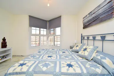 Cama o camas de una habitación en Expoholidays - MAGNIFICO APARTAMENTO CON VISTAS AL PUERTO