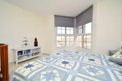 Cama o camas de una habitación en Expoholidays - MAGNIFICO APARTAMENTO CON VISTAS AL PUERTO