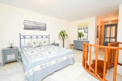 Cama o camas de una habitación en Expoholidays - MAGNIFICO APARTAMENTO CON VISTAS AL PUERTO