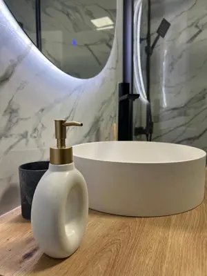 Un baño de Apartamento en primera linea de playa
